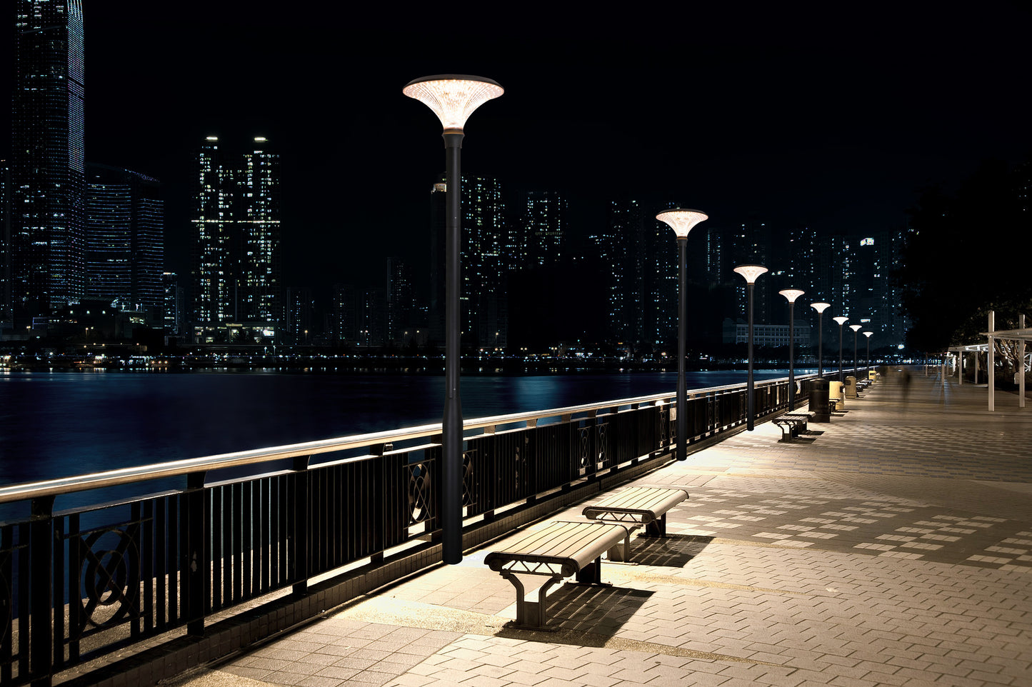 Diamond Series Solar Garden Light TYD6605 installed along a waterfront promenade