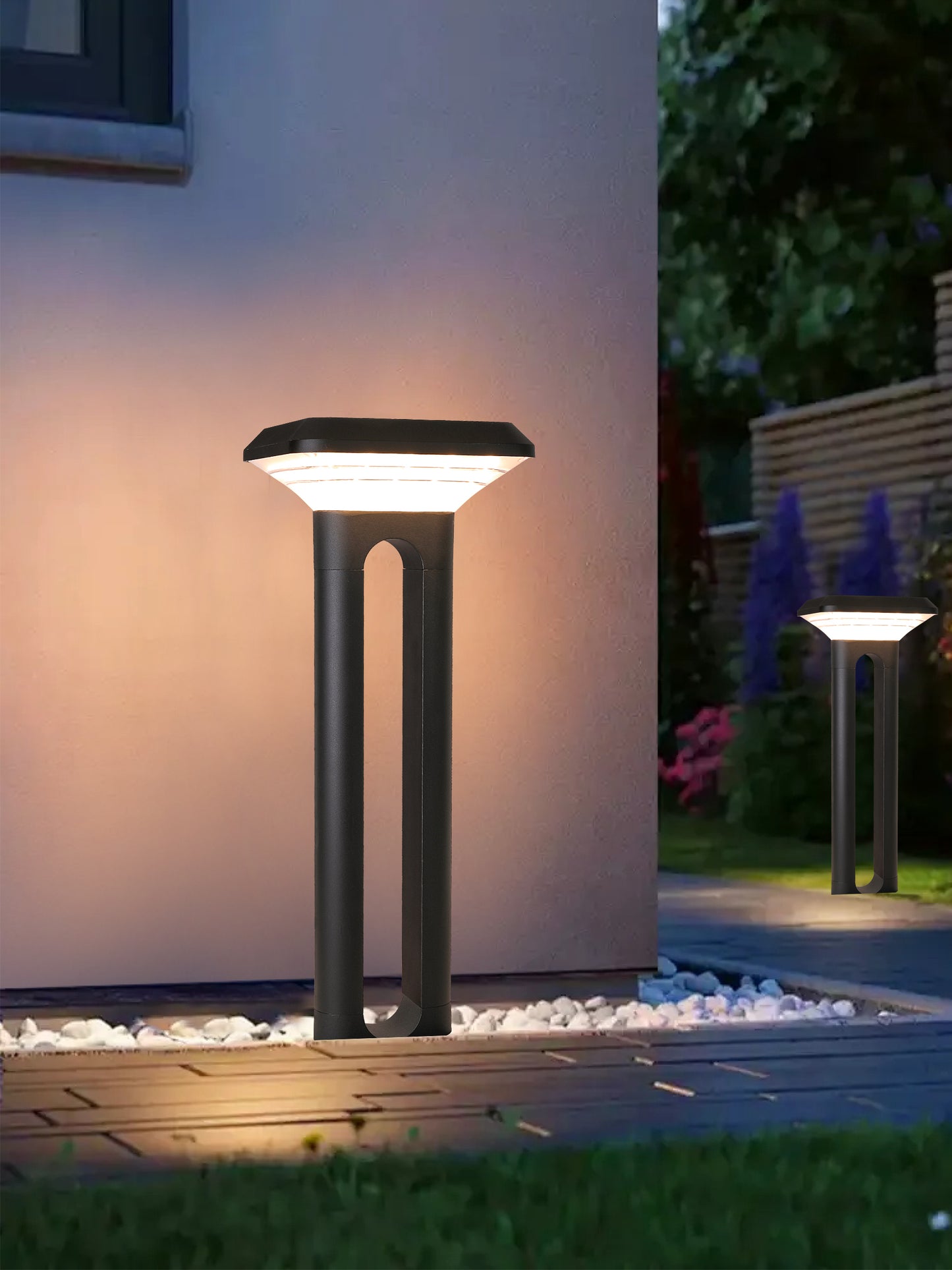 Ark Series Solar Lawn Light CPD1201 lighting a courtyard wall, deck edge and garden pathway