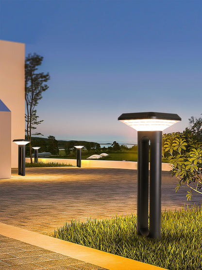 Ark Series Solar Lawn Light CPD1201 installed beside a modern terrace lawn with warm pathway lighting