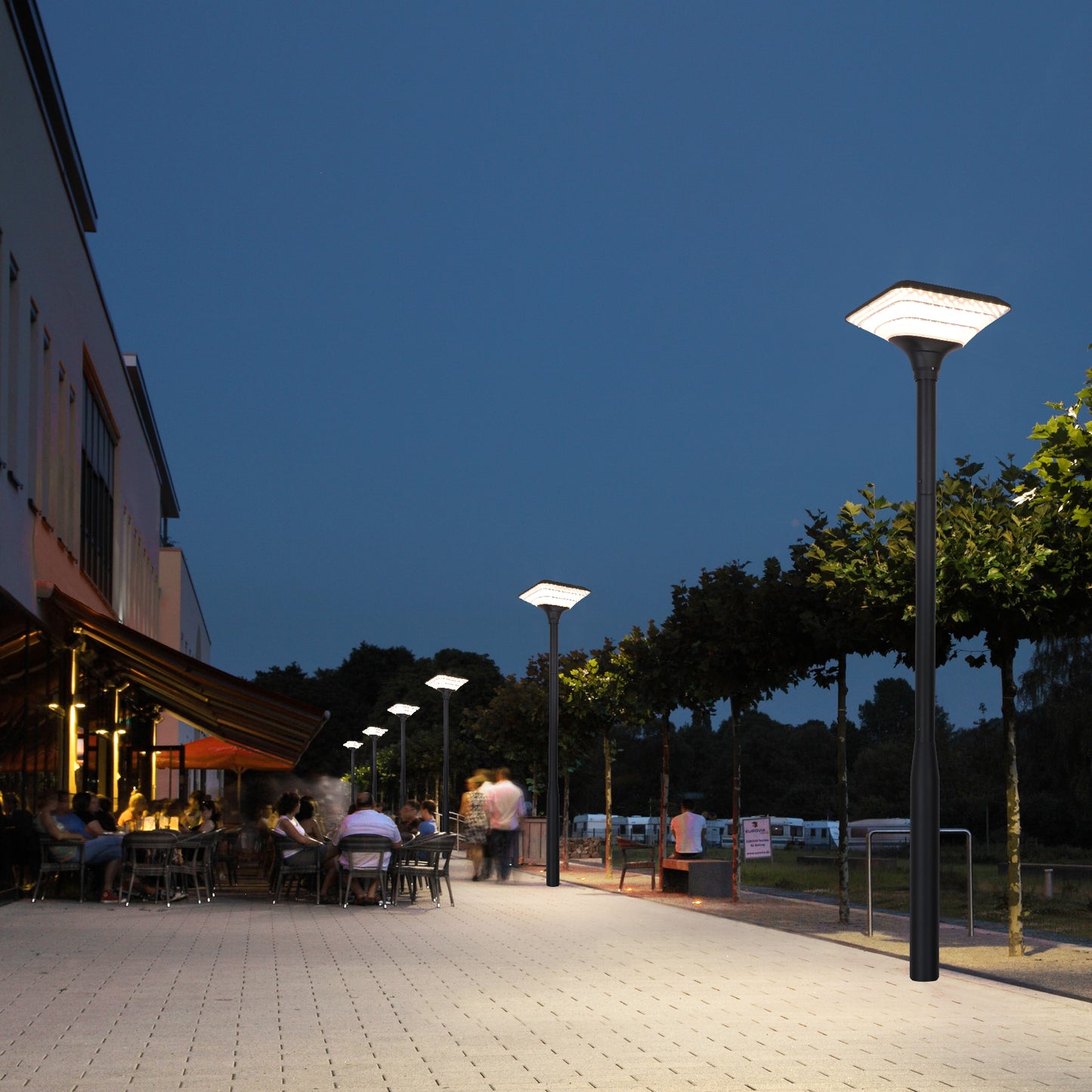 Ark solar garden light installed in an outdoor restaurant seating area