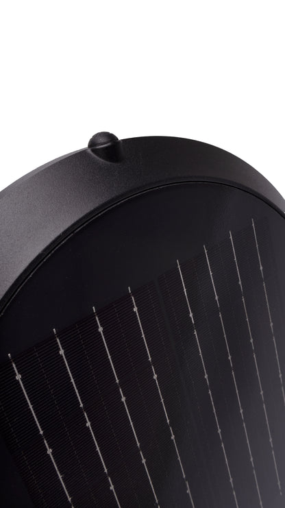 Close-up detail of Glass Cup Series Solar Wall Light GT-BD1005 integrated solar panel and black circular housing