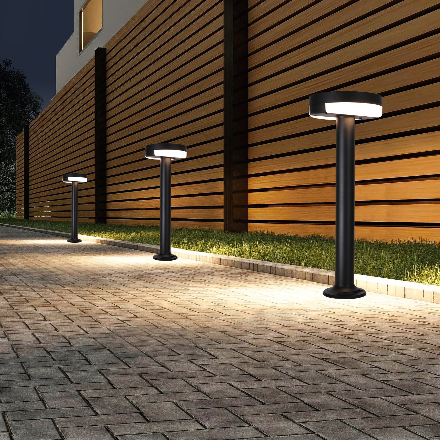 Moon Shadow Series Solar Lawn Light CPD1107 installed along a modern fence pathway