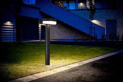 Moon Shadow Series Solar Lawn Light CPD1107 providing soft lighting for residential lawn at night