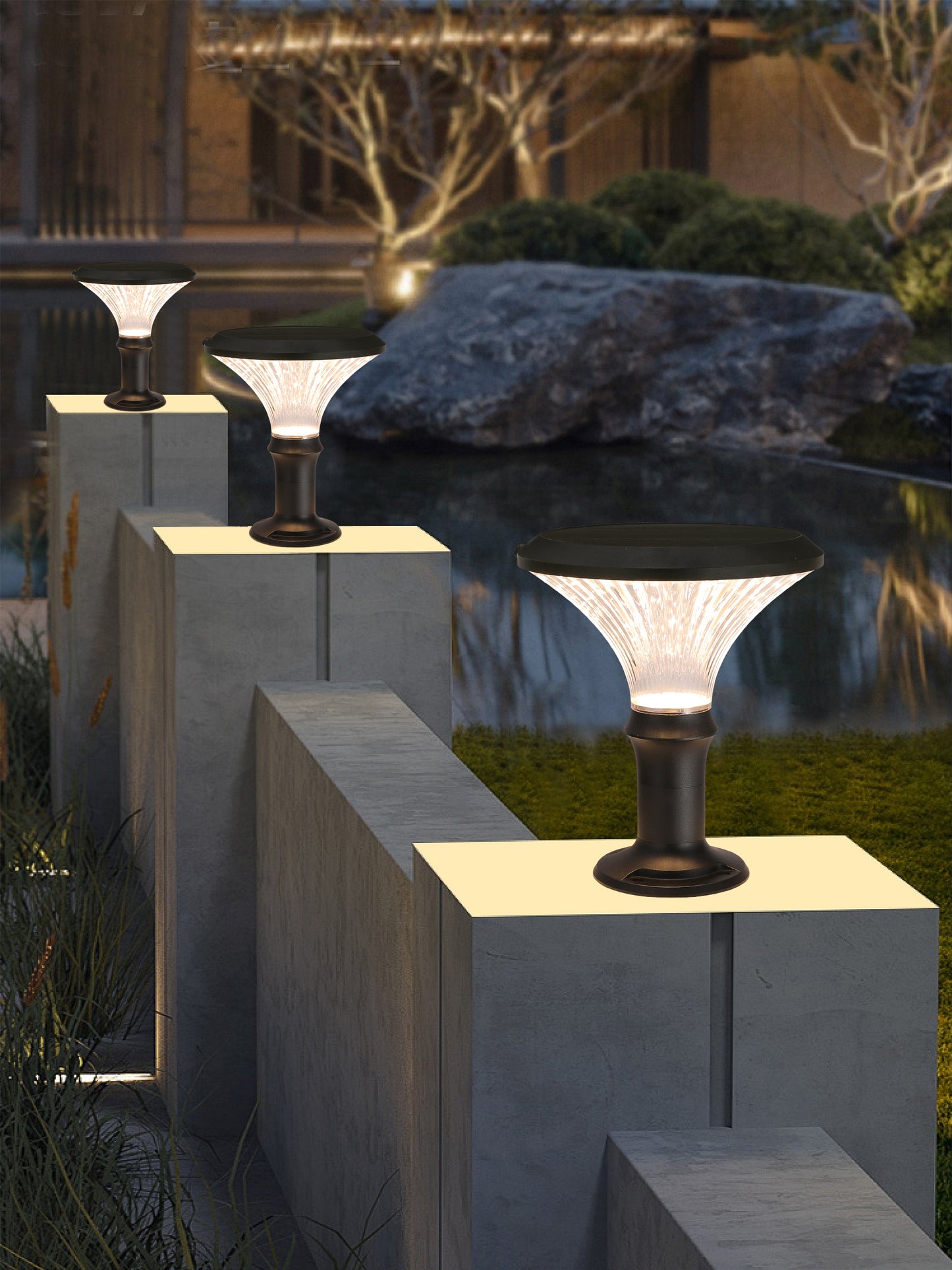 Round Diamond Series solar pillar light ZTD3002 installed on landscape wall columns near garden water feature