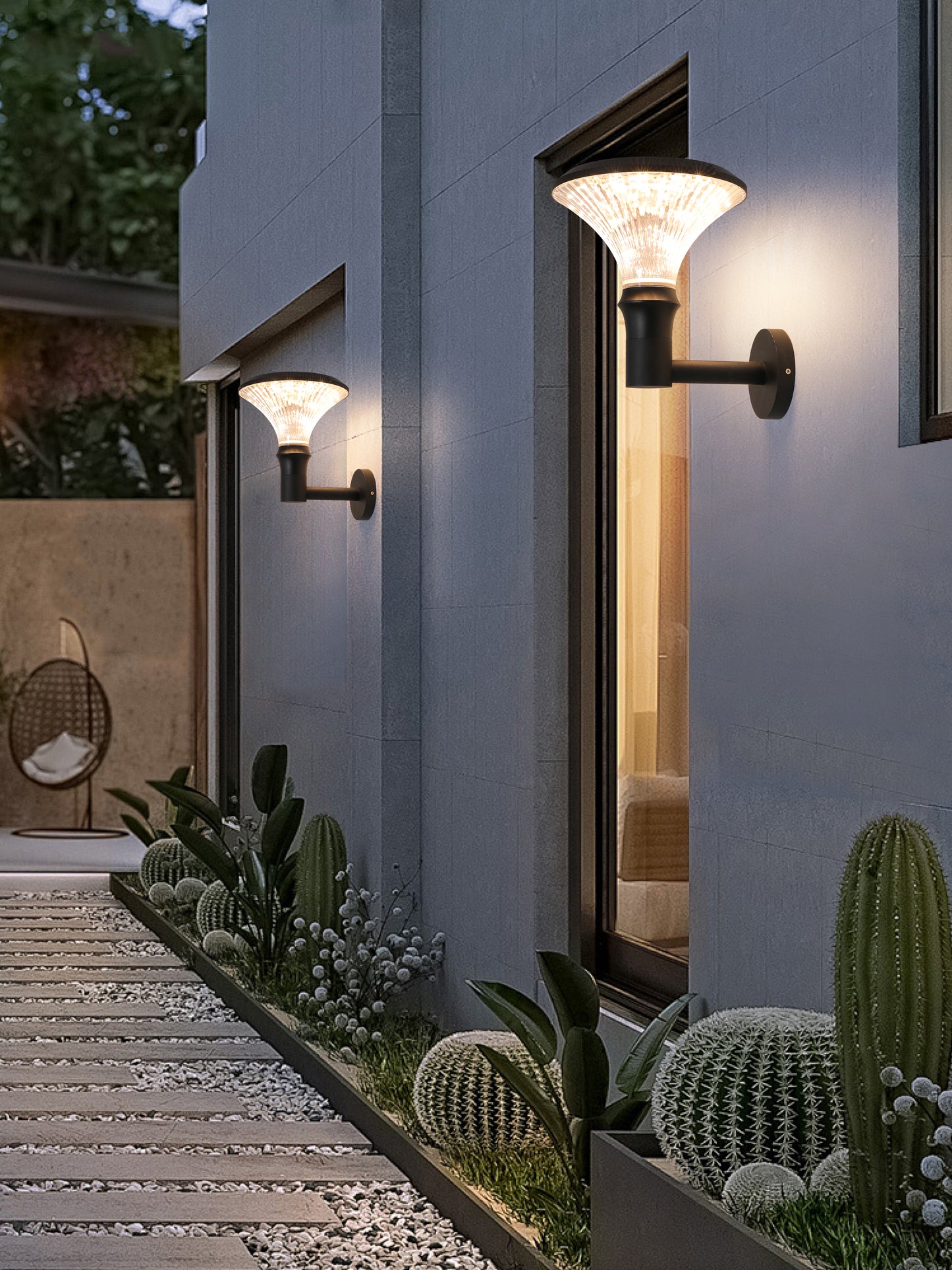 Round Diamond Series Solar Wall Light BD3002 illuminating a garden path beside modern exterior walls