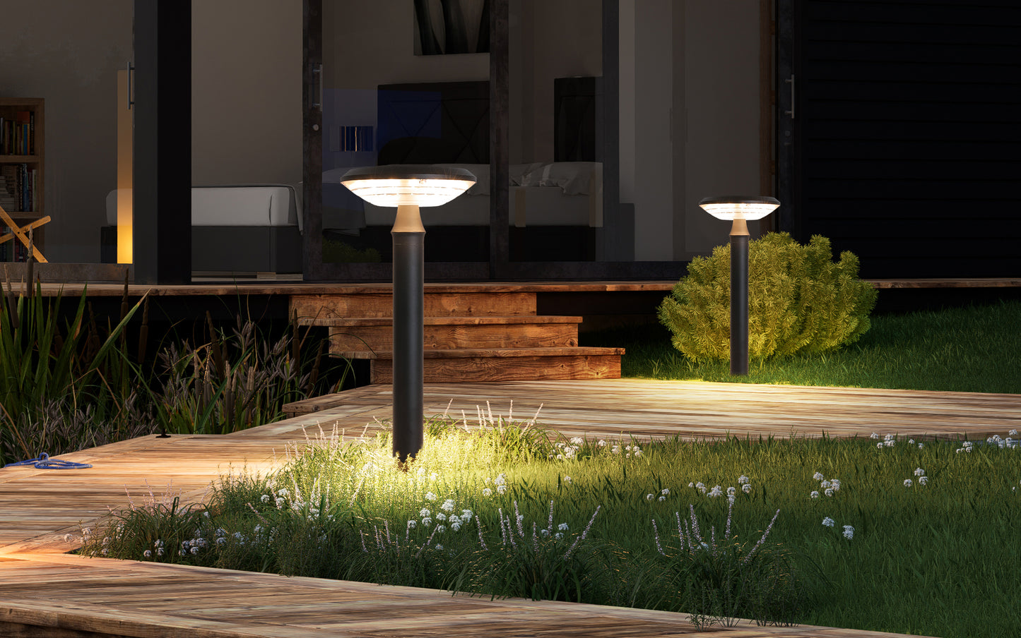 Round Moon Series solar lawn lights creating warm lighting beside a deck and lawn