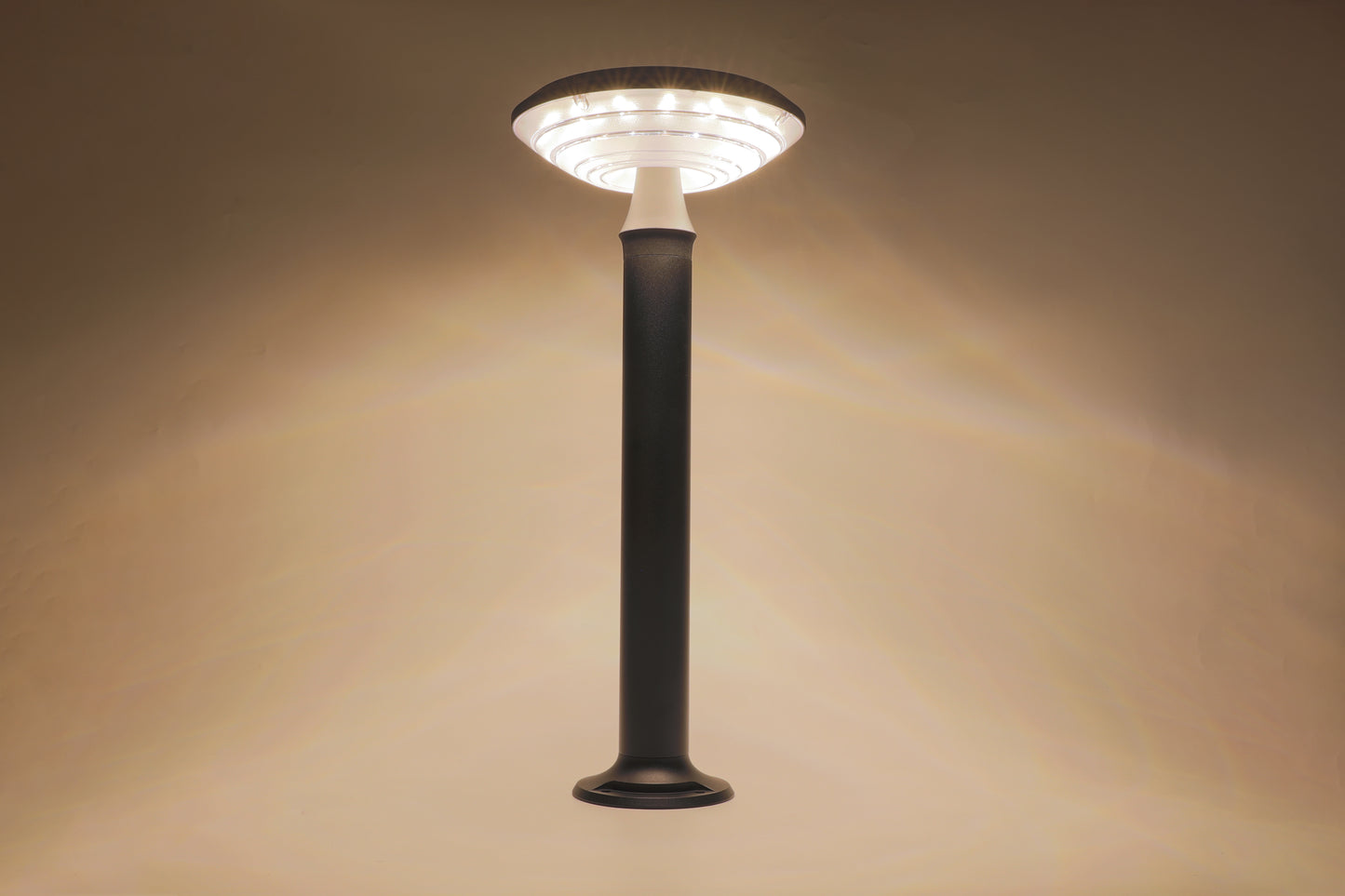 Round Moon Series Solar Lawn Light CPD3202 showing warm lighting effect indoors