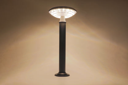 Round Moon Series Solar Lawn Light CPD3202 showing warm lighting effect indoors
