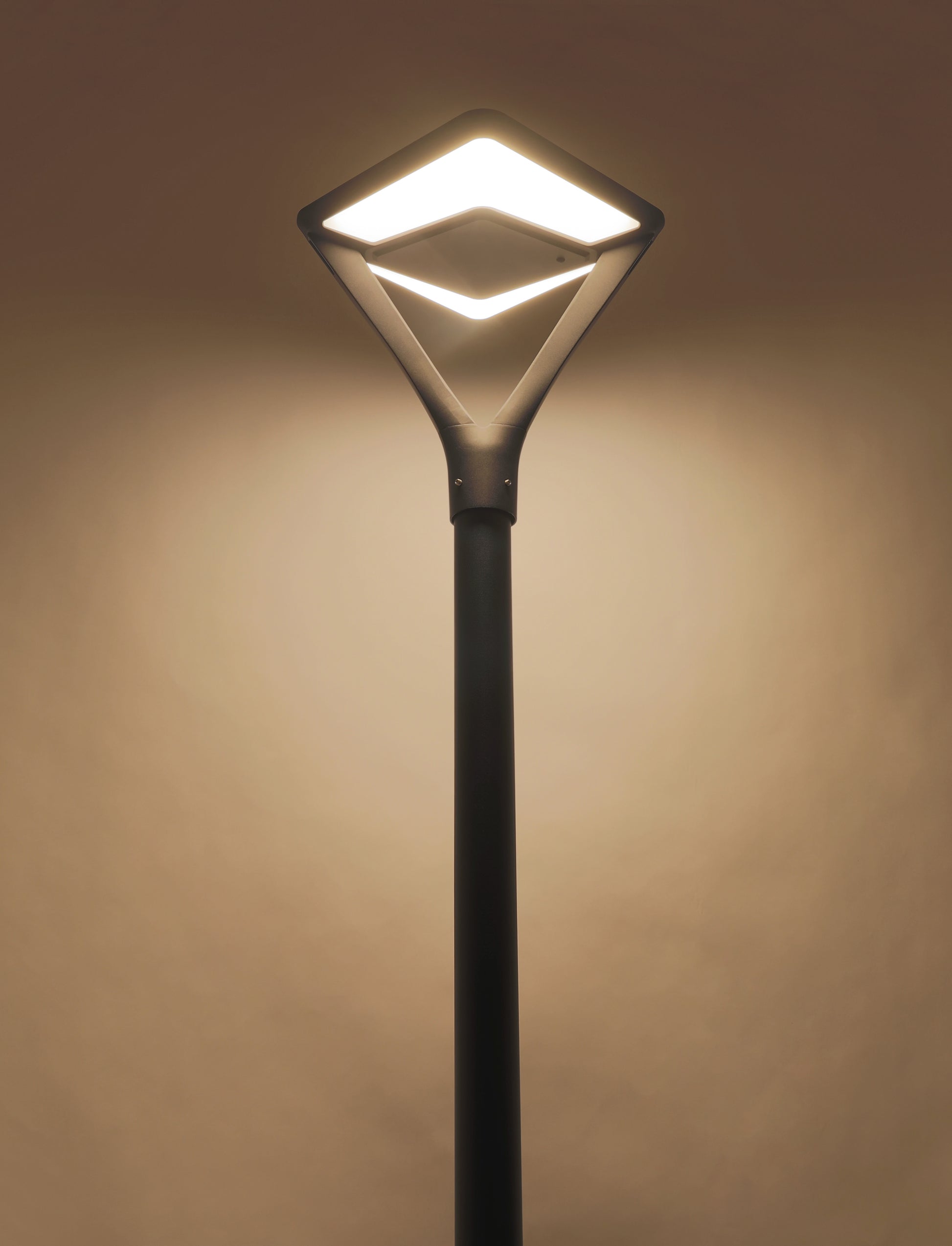 Close-up of Twinstar Series solar garden light TYD3015 with warm lighting effect