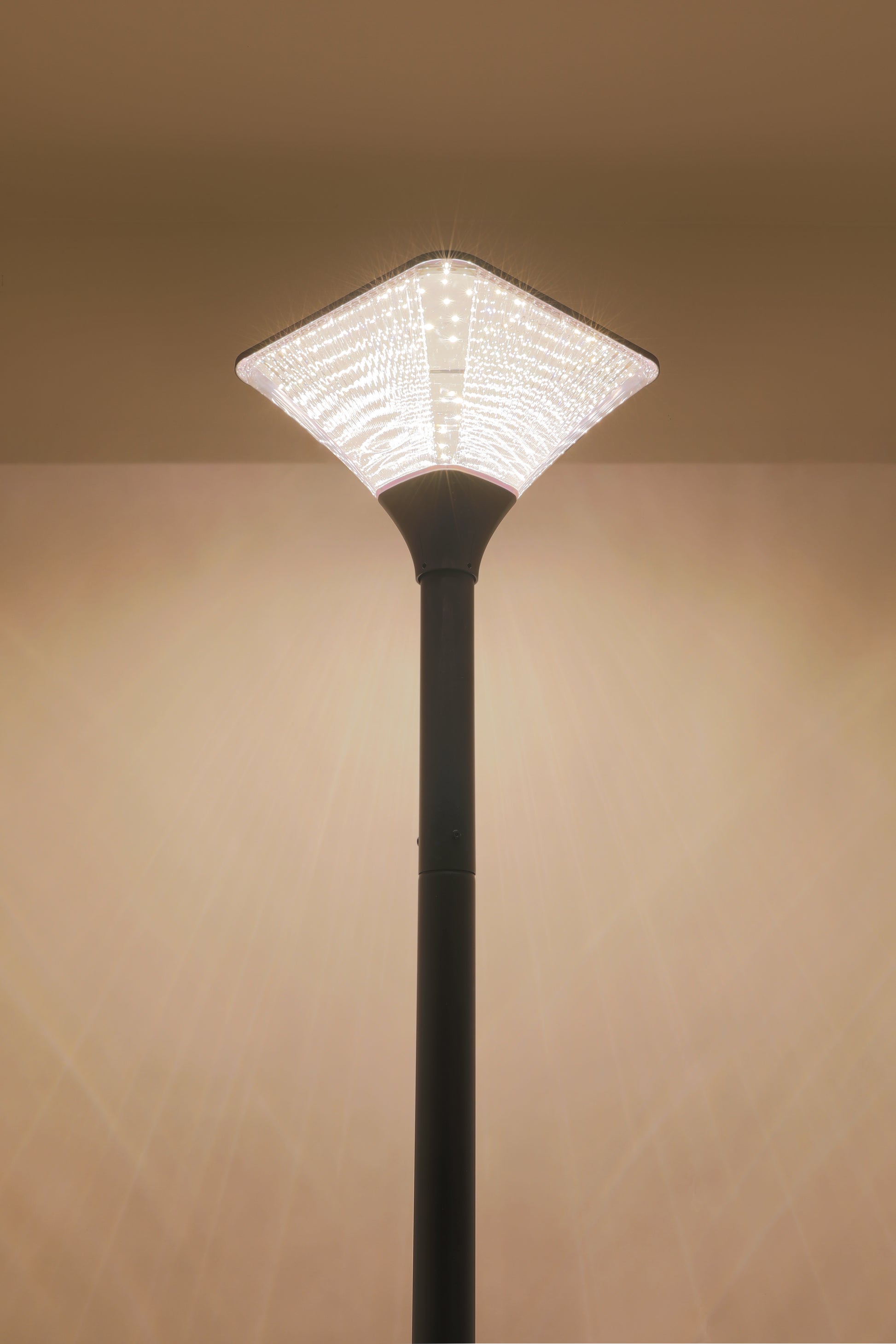 TYD8805 Square Diamond solar garden light showing warm nighttime lighting effect